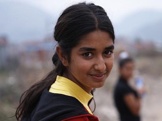 Junge Frau auf der Flucht-Foto Caritas.jpeg